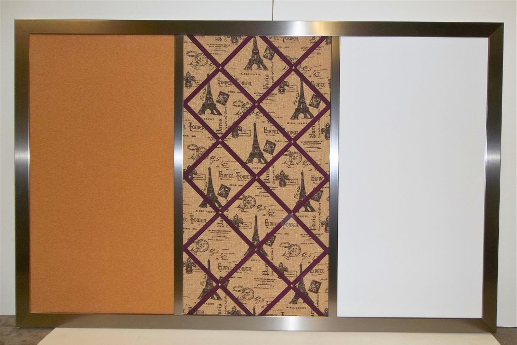 This board combines cork, fabric, and a whiteboard for a stylish and functional design. With a wooden frame, it adds warmth to any space. Customize yours to fit your needs!