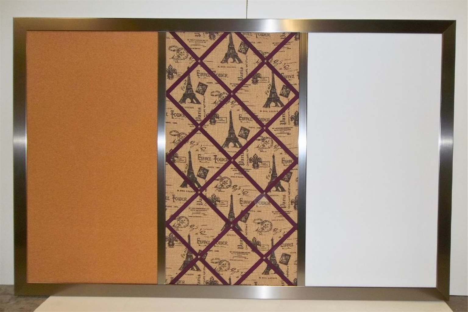 This board combines cork, fabric, and a whiteboard for a stylish and functional design. With a wooden frame, it adds warmth to any space. Customize yours to fit your needs!